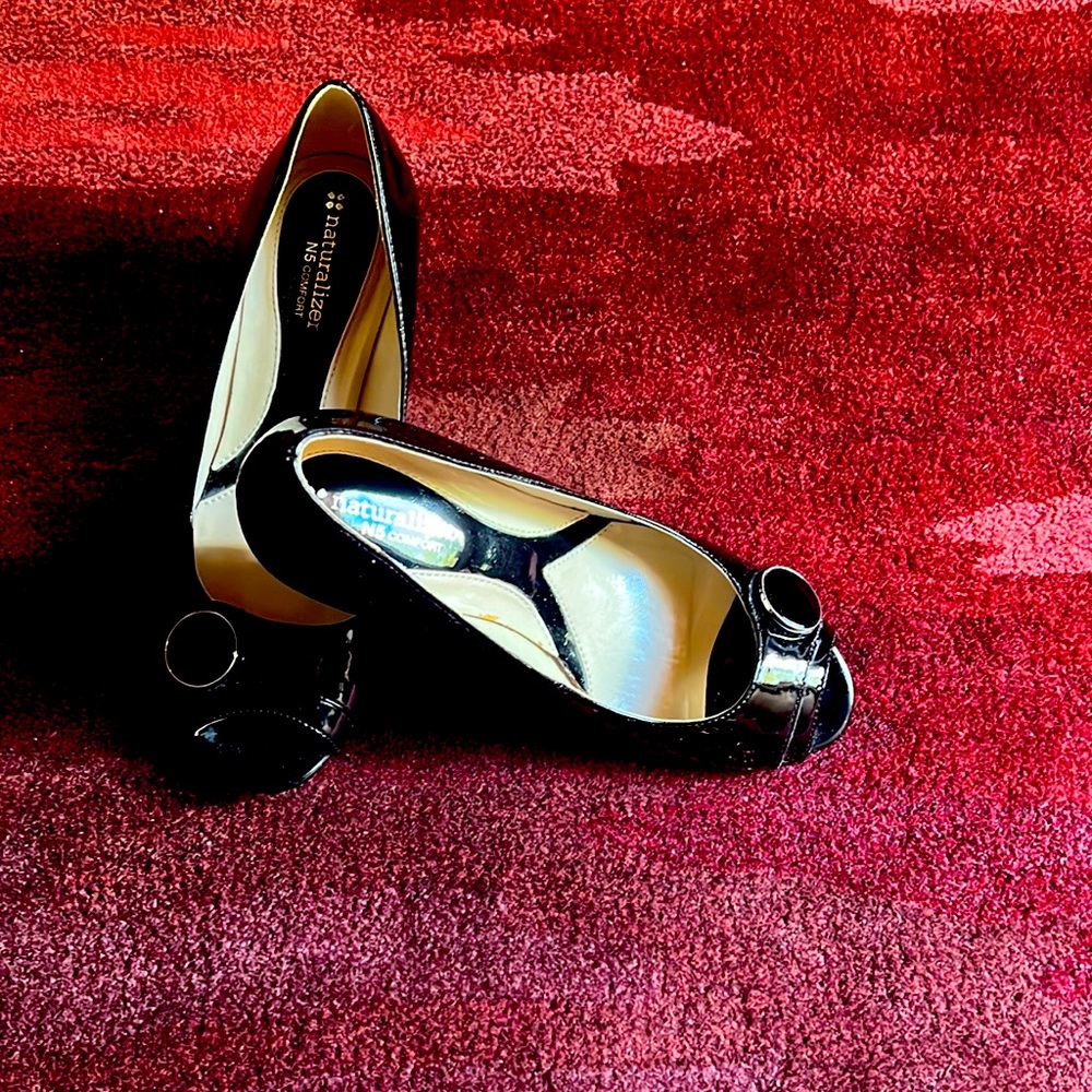 Naturalizer’s N5 Comfort Bonna Black Patent Leather Peep Toe Wedge Pumps.